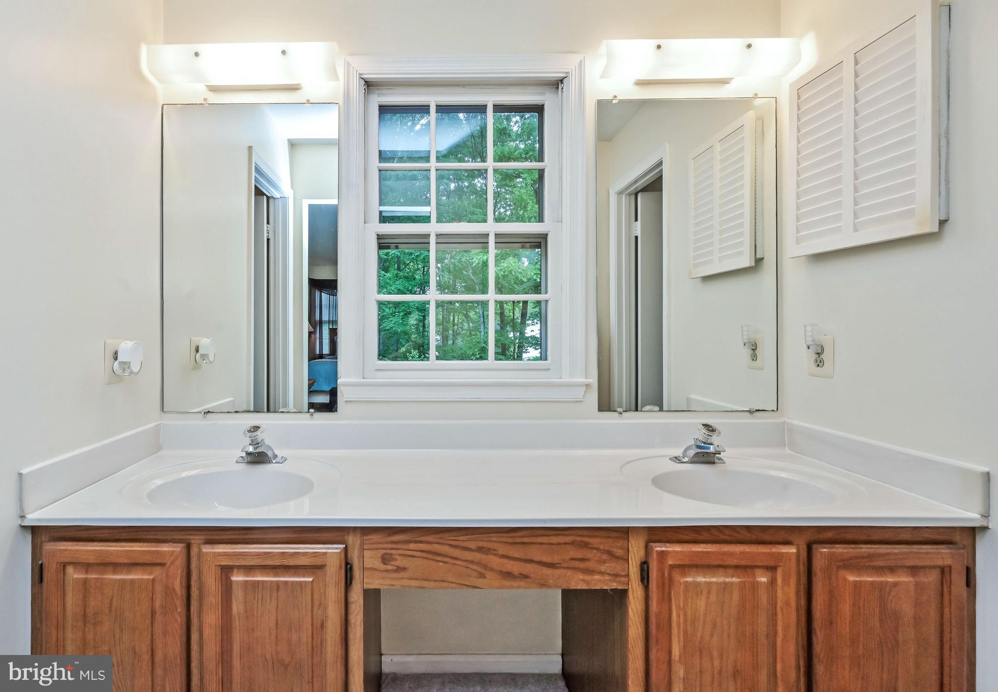 9754 Ironmaster Drive Burke, VA 22015 - Photo 15 of 34 Dual sinks in master bath