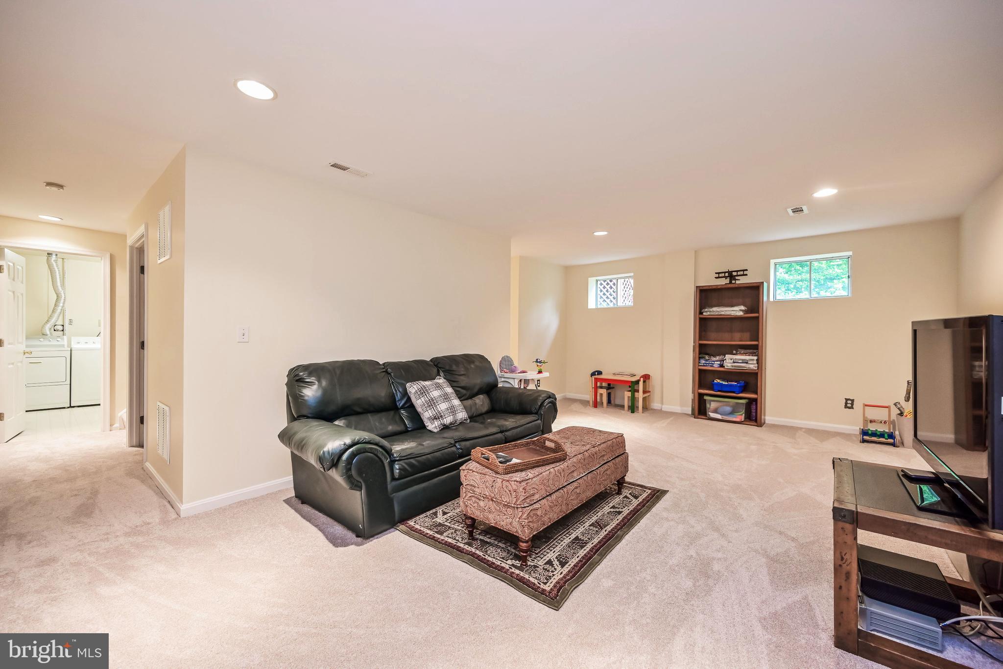 9754 Ironmaster Drive Burke, VA 22015 - Photo 21 of 34 Huge recreation room in basement