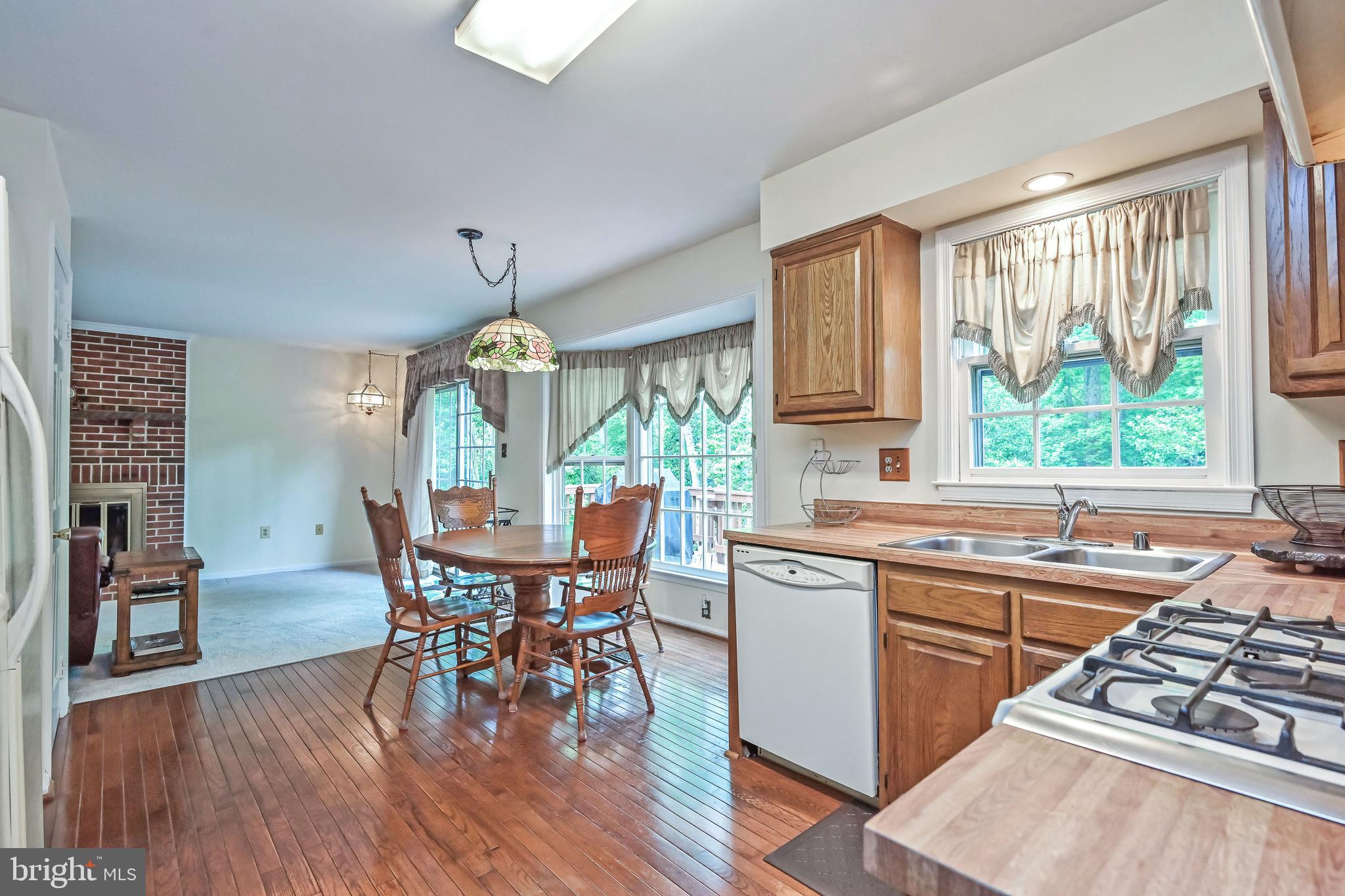 9754 Ironmaster Drive Burke, VA 22015 - Photo 7 of 34 Eat-in kitchen with lots of light!