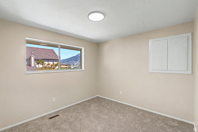 1933 Rua Branco Drive, Unit 107 Sandy, UT 84093 - Photo 19 of 32 Bedroom 3 window view