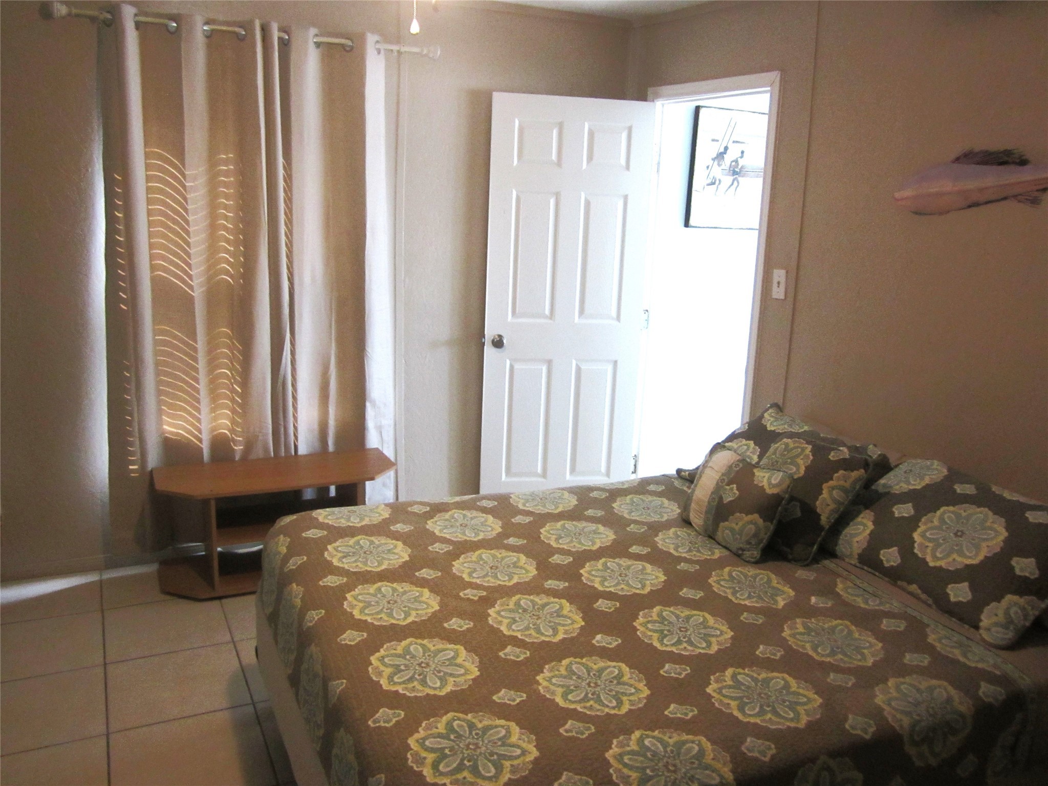 21639 Termini-San Luis Pass Road Galveston, TX 77554 - Photo 16 of 33 a bedroom with a bed and a window