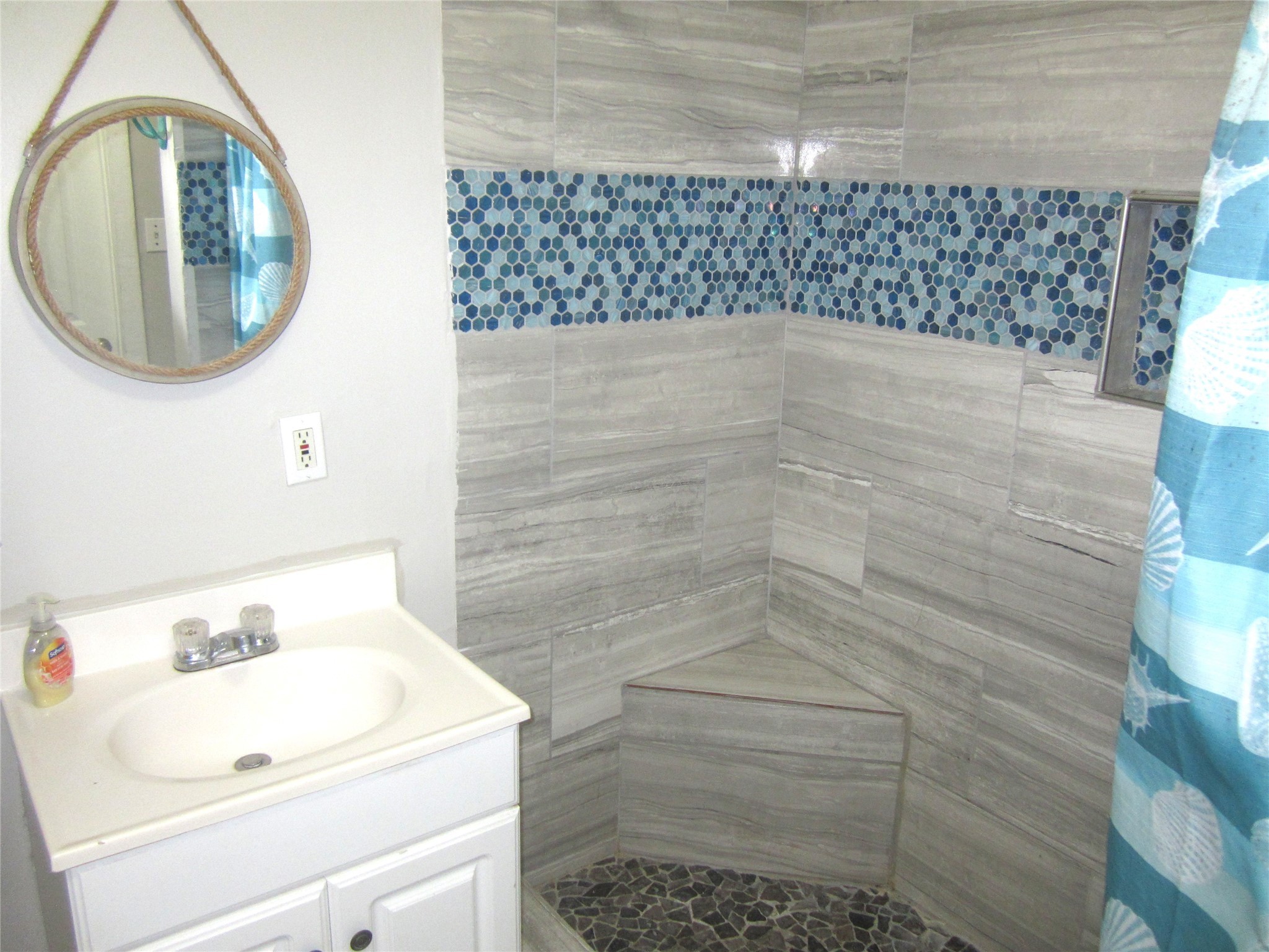 21639 Termini-San Luis Pass Road Galveston, TX 77554 - Photo 18 of 33 a bathroom with a bathtub and a sink