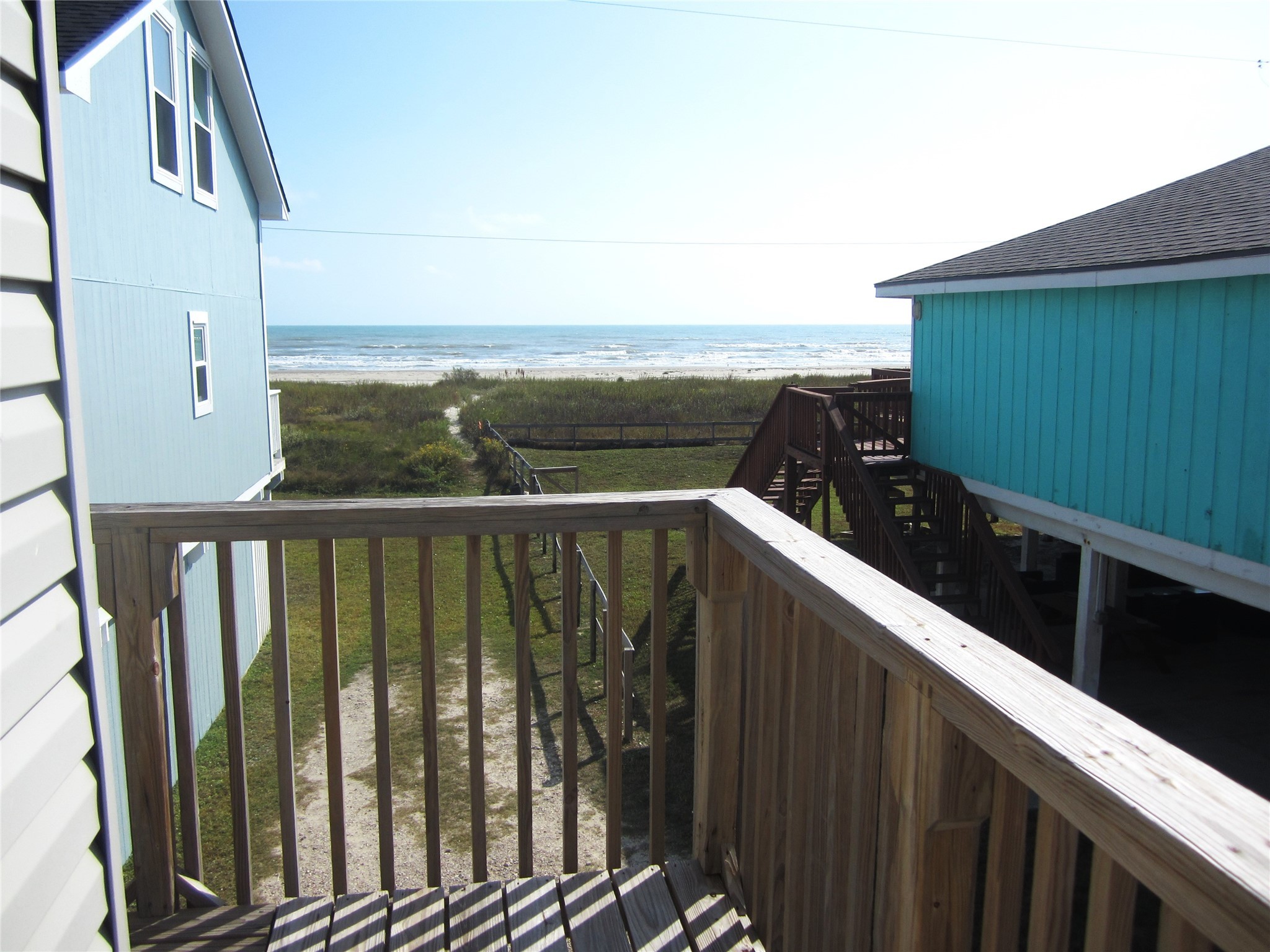 21639 Termini-San Luis Pass Road Galveston, TX 77554 - Photo 5 of 33 a balcony with an outdoor view