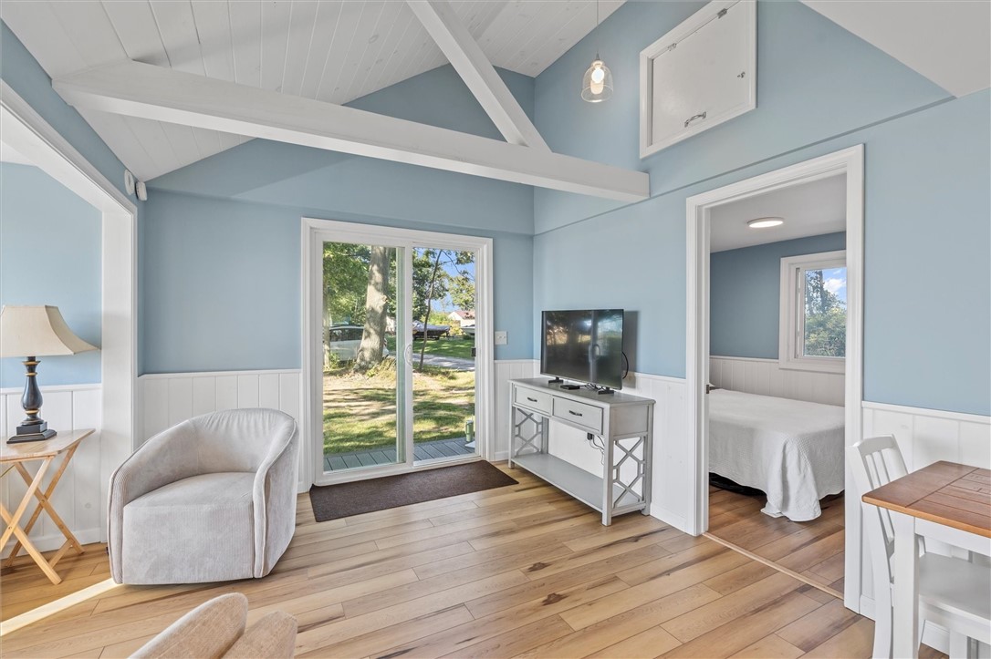 81 North Rainbow Shores Road Sandy Creek, NY 13142 - Photo 15 of 50 Cathedral Ceiling and view of 1st bedroom