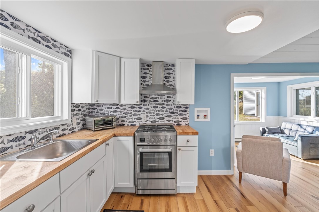 81 North Rainbow Shores Road Sandy Creek, NY 13142 - Photo 22 of 50 Kitchen view from 2nd bedroom entryway