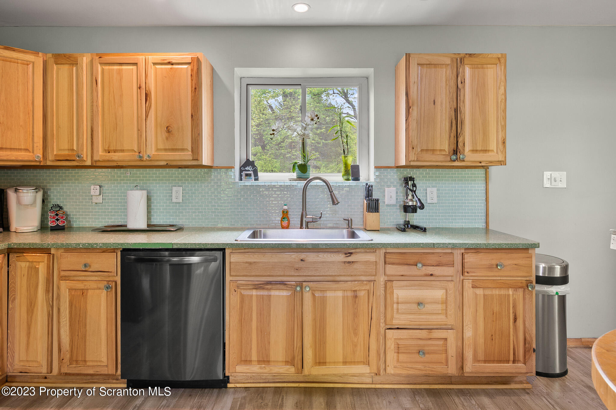 311 River Road Falls, PA 18615 - Photo 13 of 30 a kitchen with a sink cabinets and window