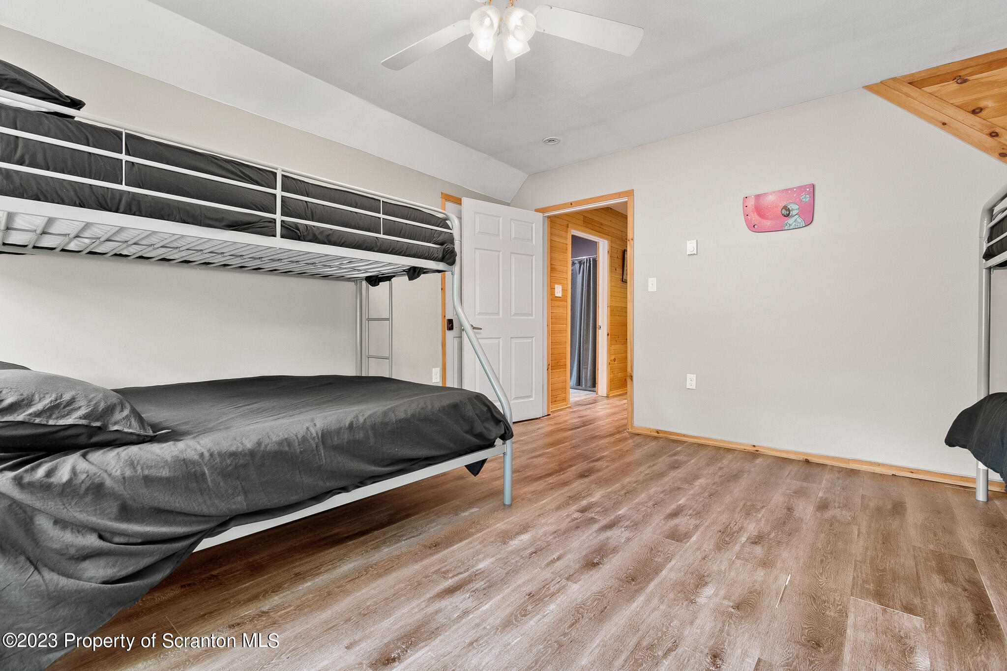 311 River Road Falls, PA 18615 - Photo 17 of 30 a bedroom with a bed and a ceiling fan