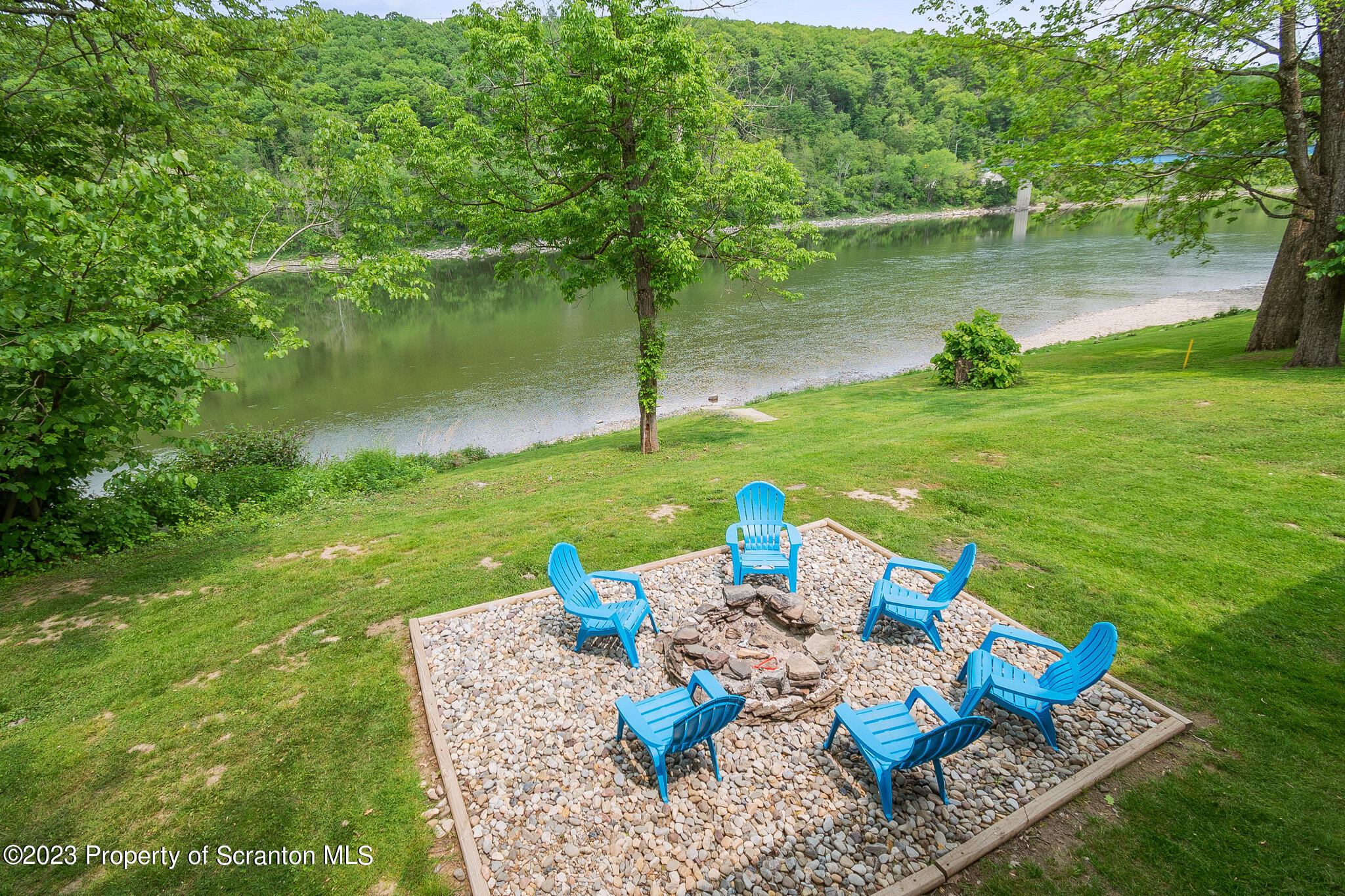 311 River Road Falls, PA 18615 - Photo 3 of 30 a view of a lake with patio