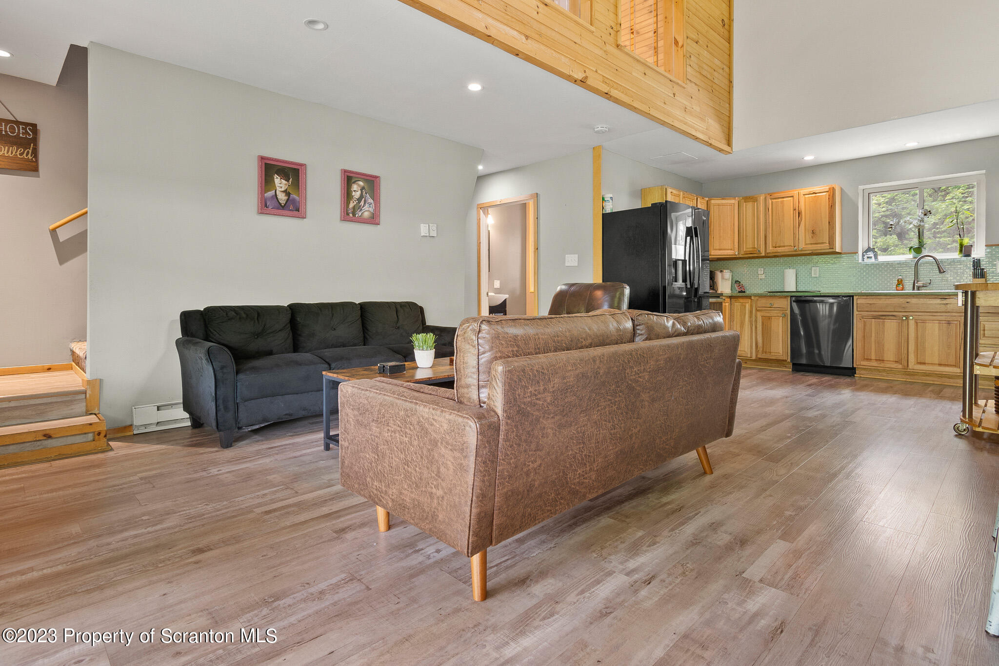 311 River Road Falls, PA 18615 - Photo 8 of 30 a living room with furniture and a wooden floor