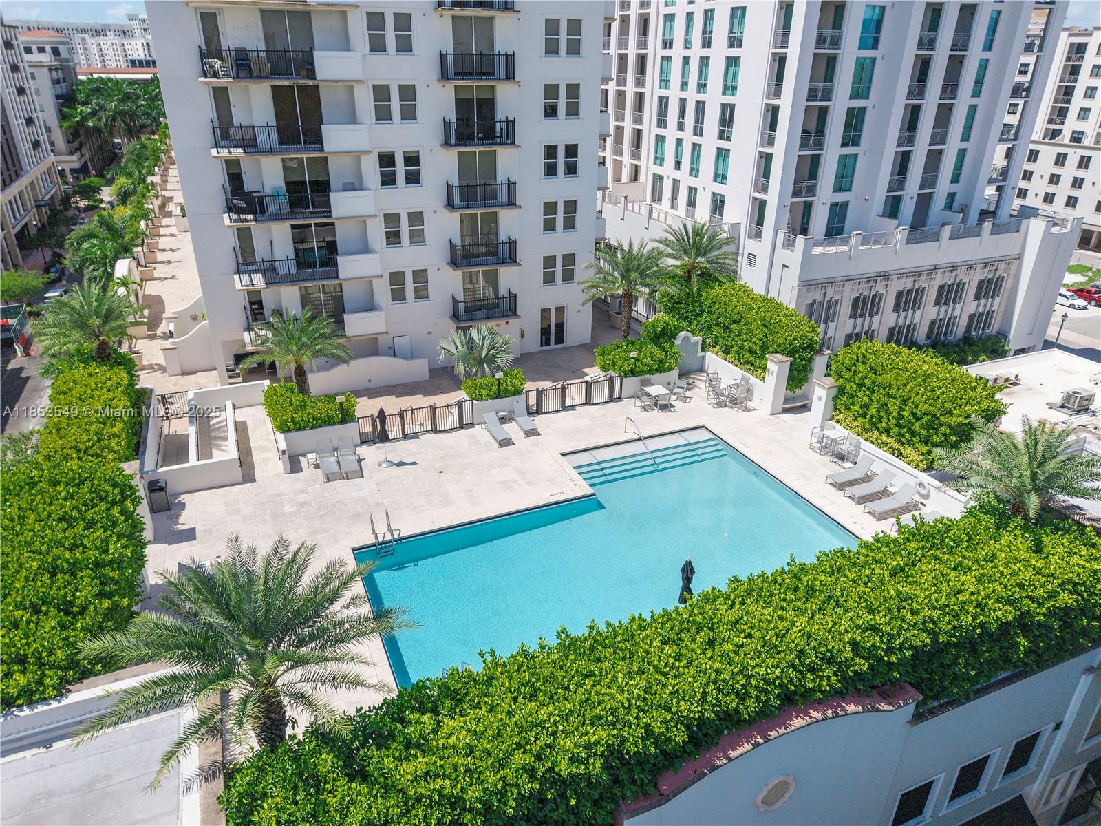 4100 Salzedo Street, Unit 409 Coral Gables, FL 33146 - Photo 1 of 45 a view of a house with a patio