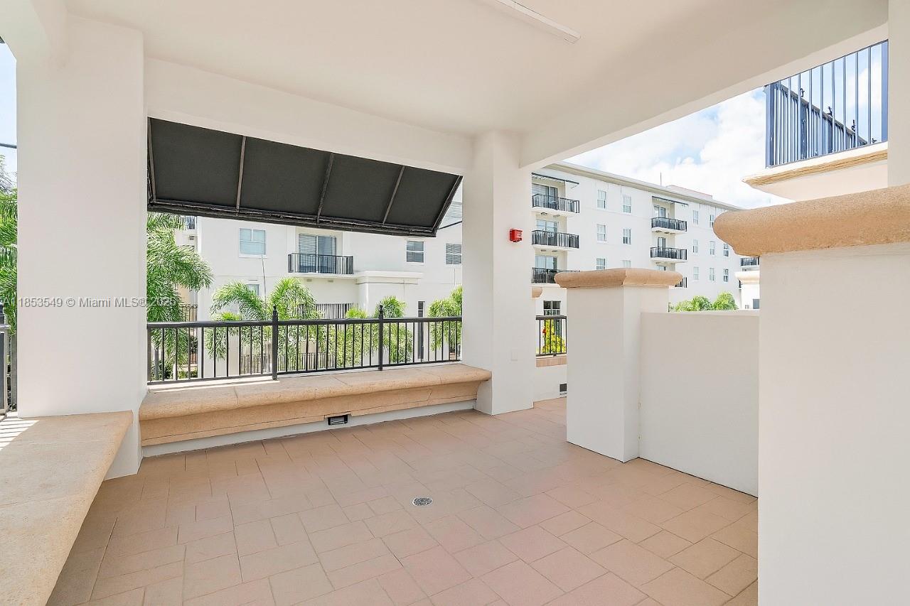 4100 Salzedo Street, Unit 409 Coral Gables, FL 33146 - Photo 23 of 45 a view of entryway with wooden floor