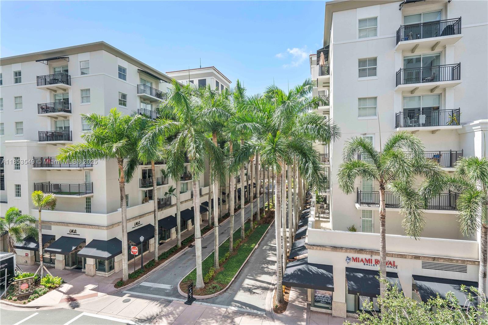 4100 Salzedo Street, Unit 409 Coral Gables, FL 33146 - Photo 25 of 45 a front view of building with yard