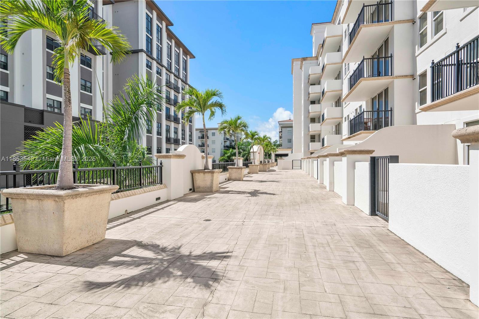 4100 Salzedo Street, Unit 409 Coral Gables, FL 33146 - Photo 28 of 45 a view of a building with potted plants