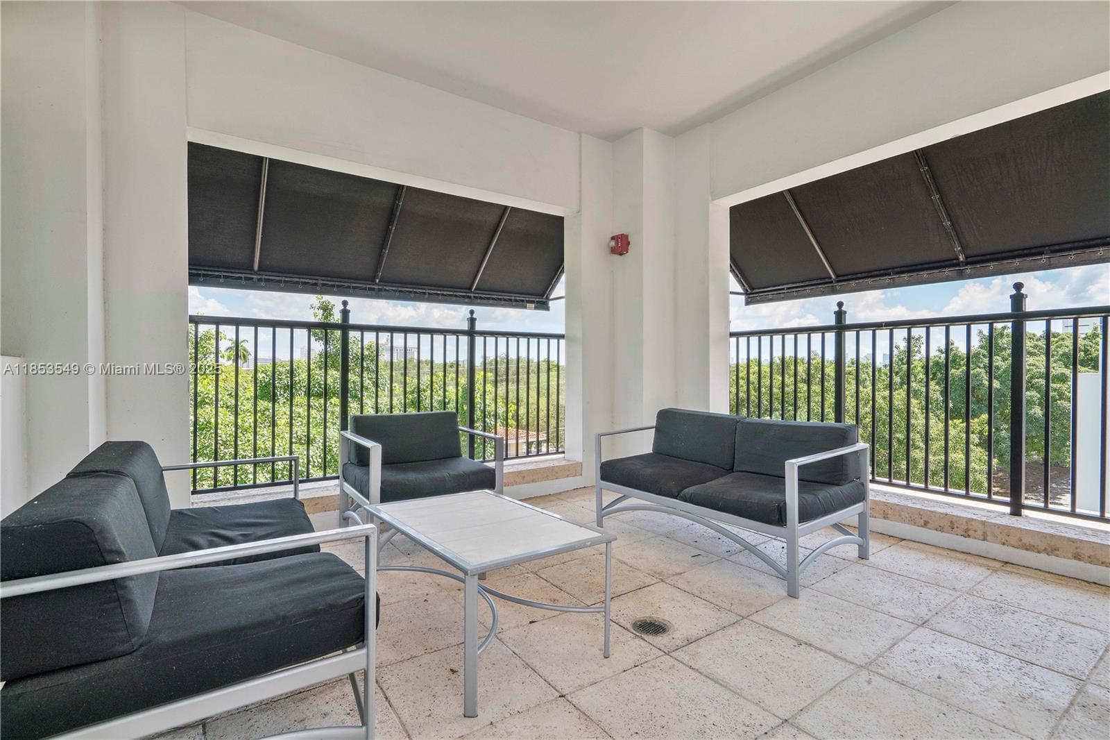4100 Salzedo Street, Unit 409 Coral Gables, FL 33146 - Photo 32 of 45 a living room with furniture