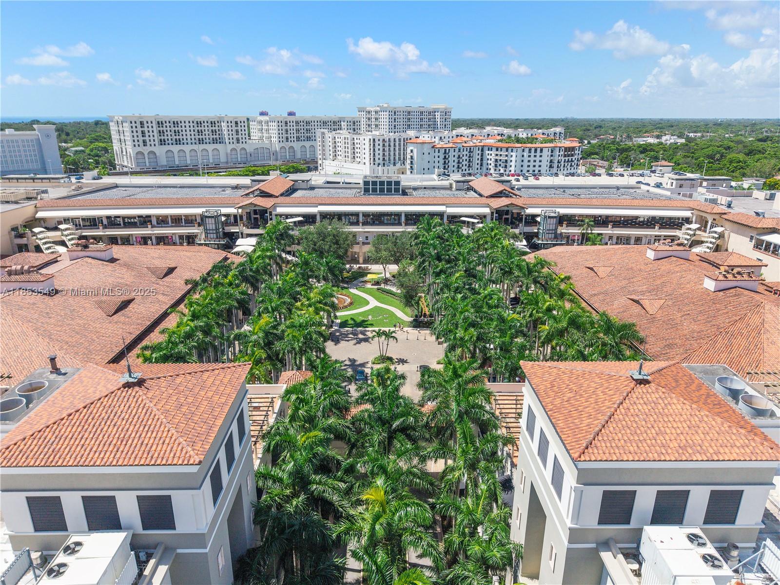 4100 Salzedo Street, Unit 409 Coral Gables, FL 33146 - Photo 39 of 45 a aerial view of a house with swimming pool and a yard