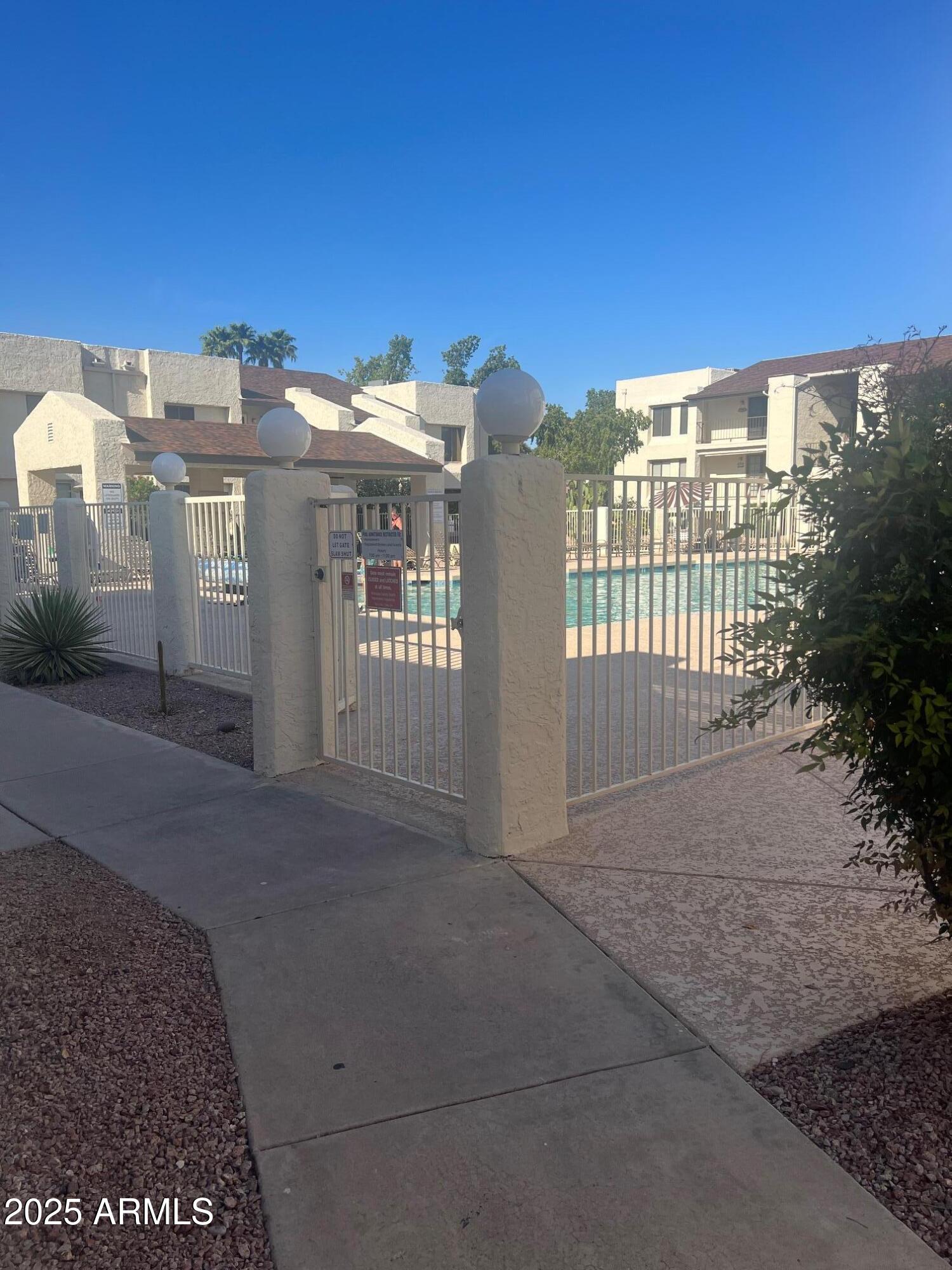 5518 East Lindstrom Lane, Unit 1044 Mesa, AZ 85215 - Photo 11 of 30 a view of a building