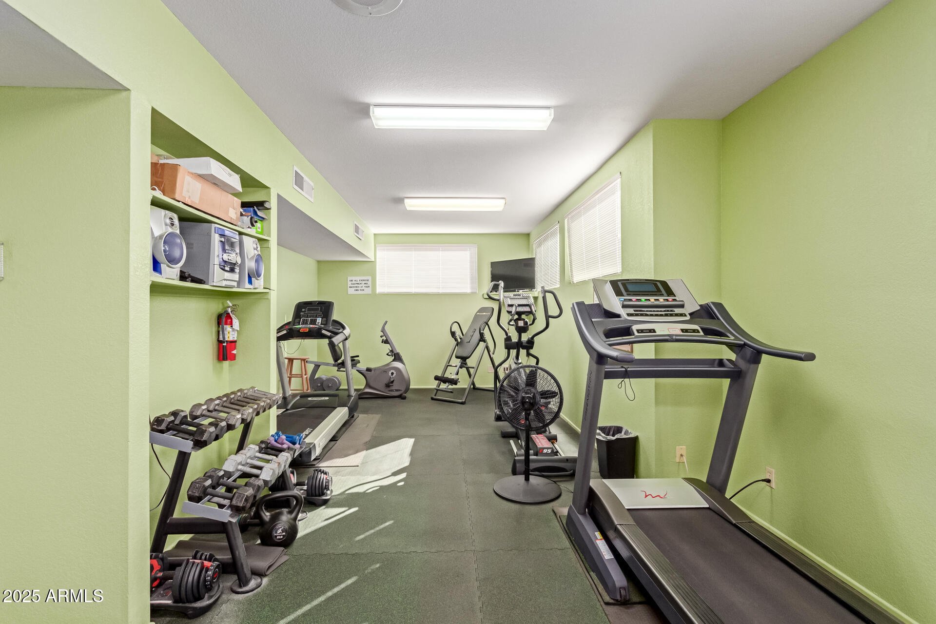 5518 East Lindstrom Lane, Unit 1044 Mesa, AZ 85215 - Photo 8 of 30 a view of a room with gym equipment
