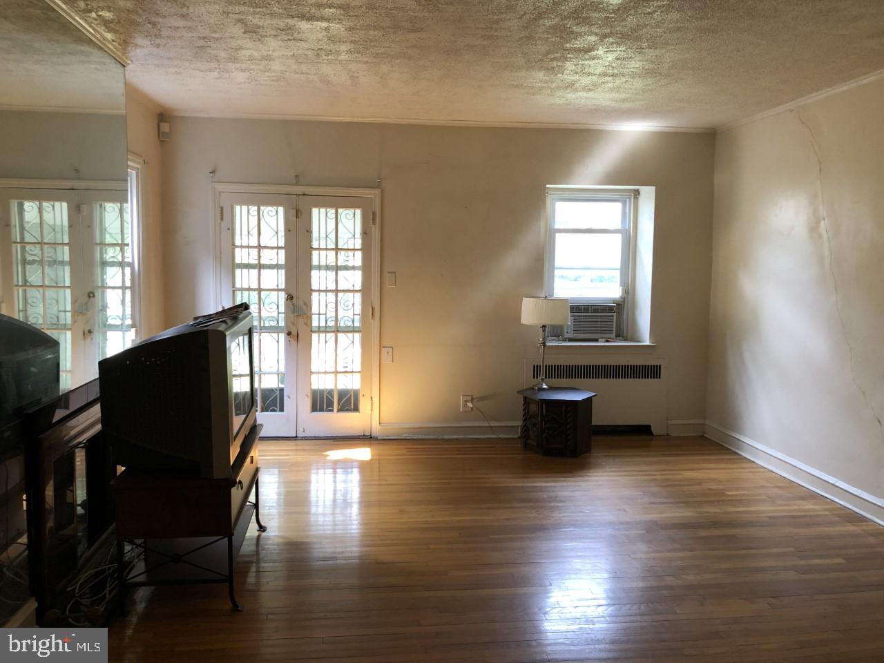 5706 Drexel Road Philadelphia, PA 19131 - Photo 6 of 20 Living Room with Fireplace