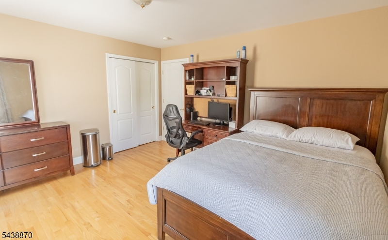 419 Putnam Road Union, NJ 07083 - Photo 24 of 37 a bedroom with a bed and a desk