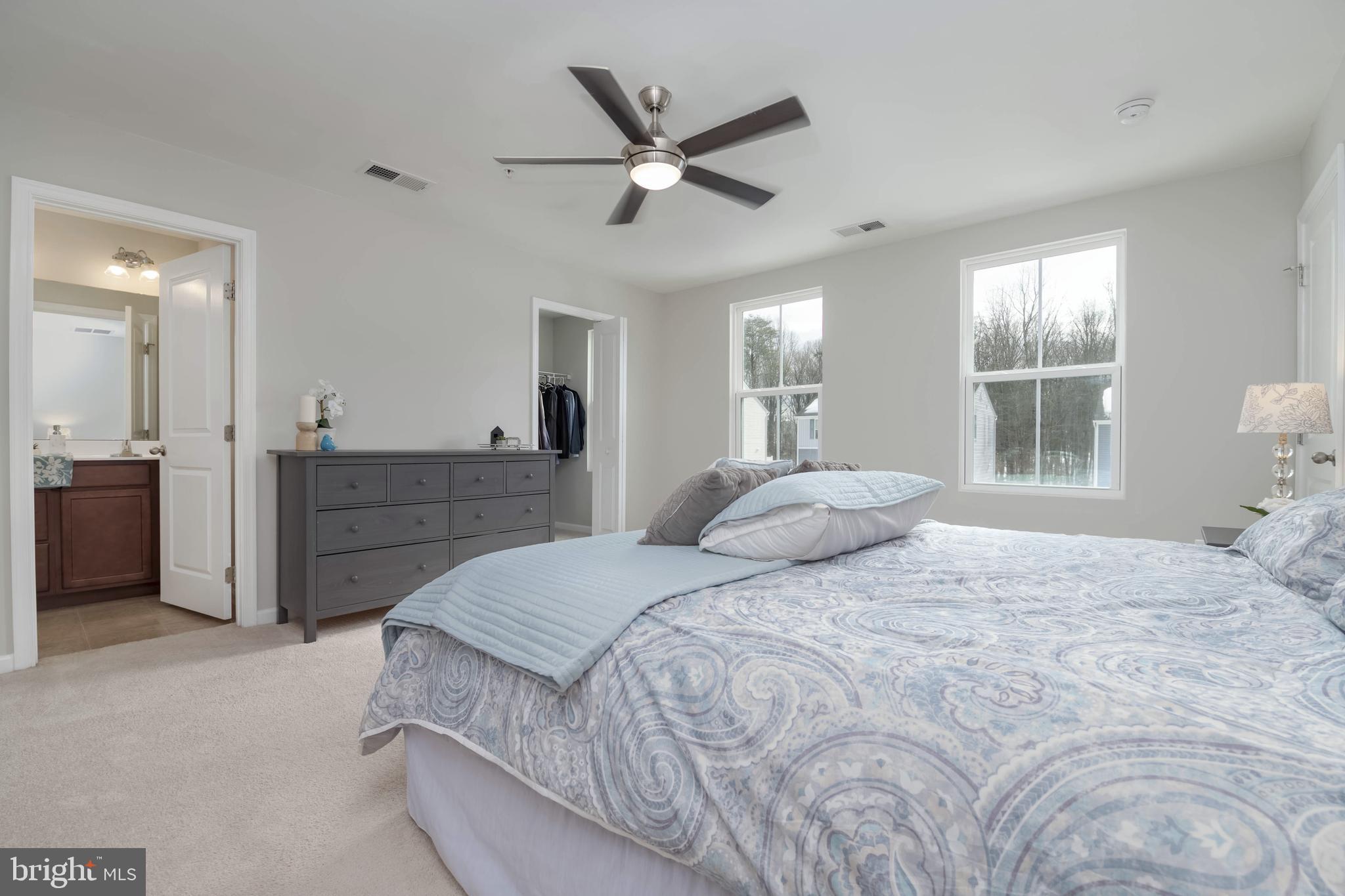 10114 Blansford Way Middle River, MD 21220 - Photo 15 of 41 a bedroom with a large bed and a window