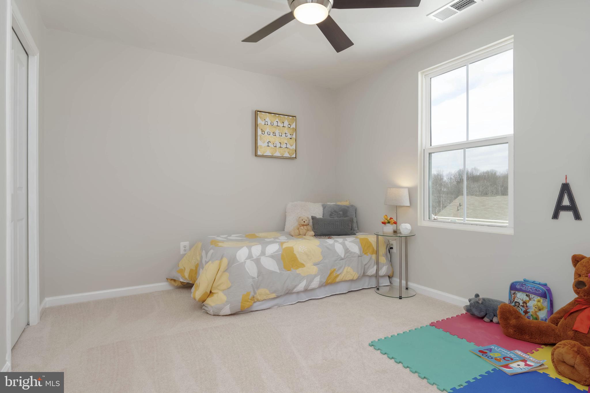 10114 Blansford Way Middle River, MD 21220 - Photo 26 of 41 a bedroom with a bed and a window