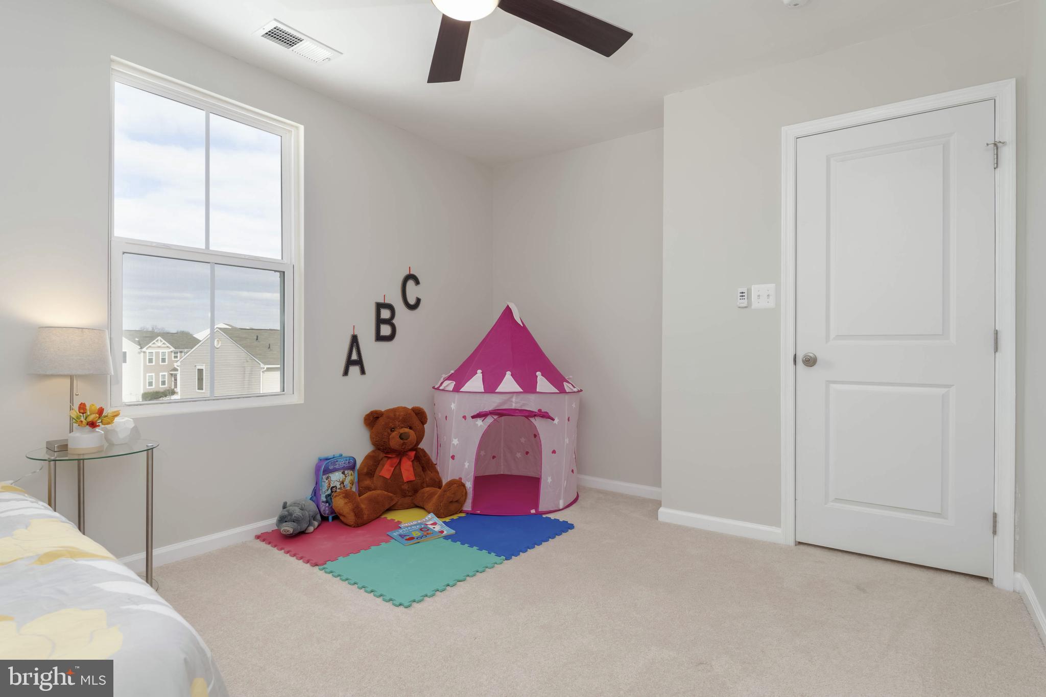 10114 Blansford Way Middle River, MD 21220 - Photo 27 of 41 a bedroom with bed and a window