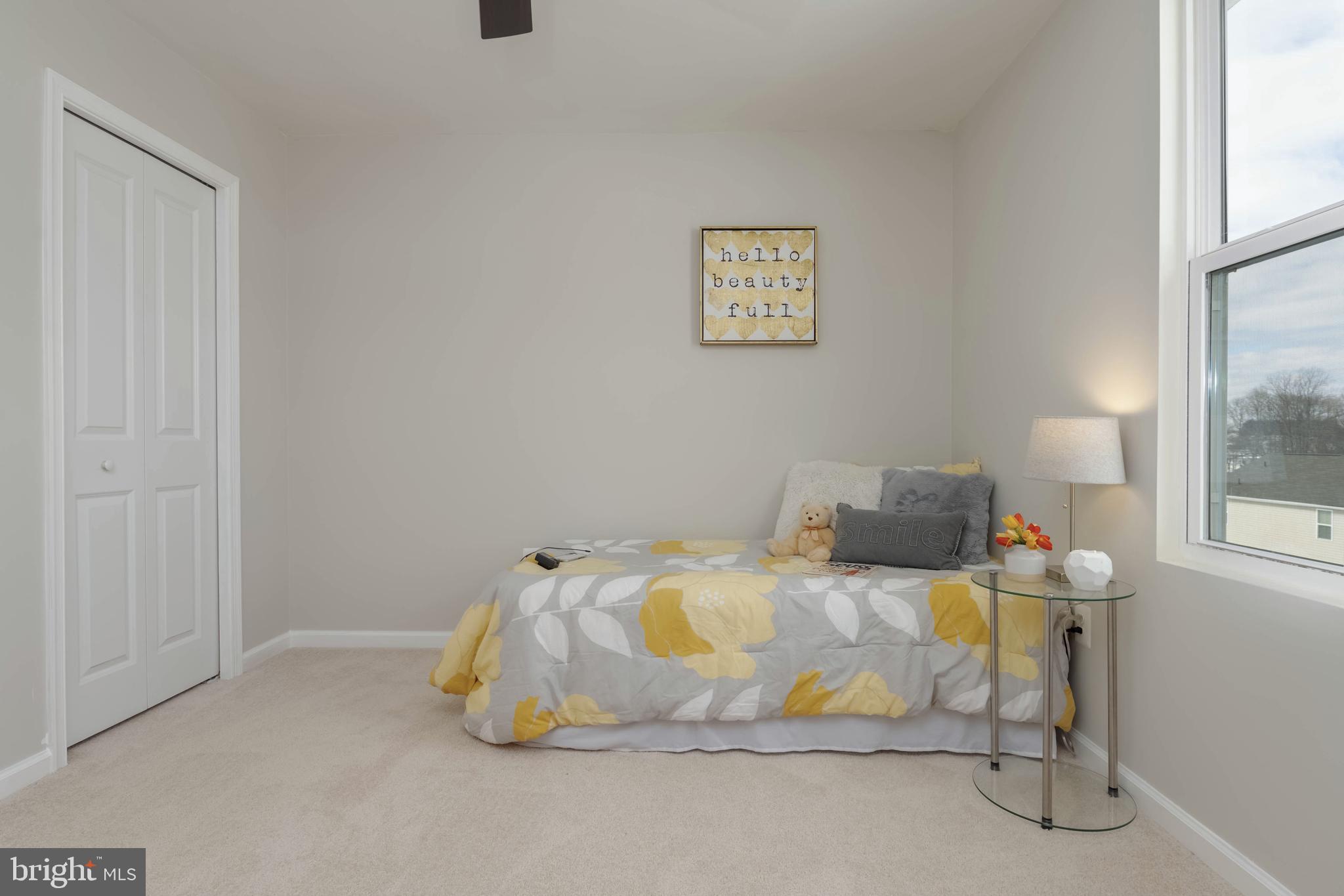 10114 Blansford Way Middle River, MD 21220 - Photo 28 of 41 a bedroom with a bed and a window