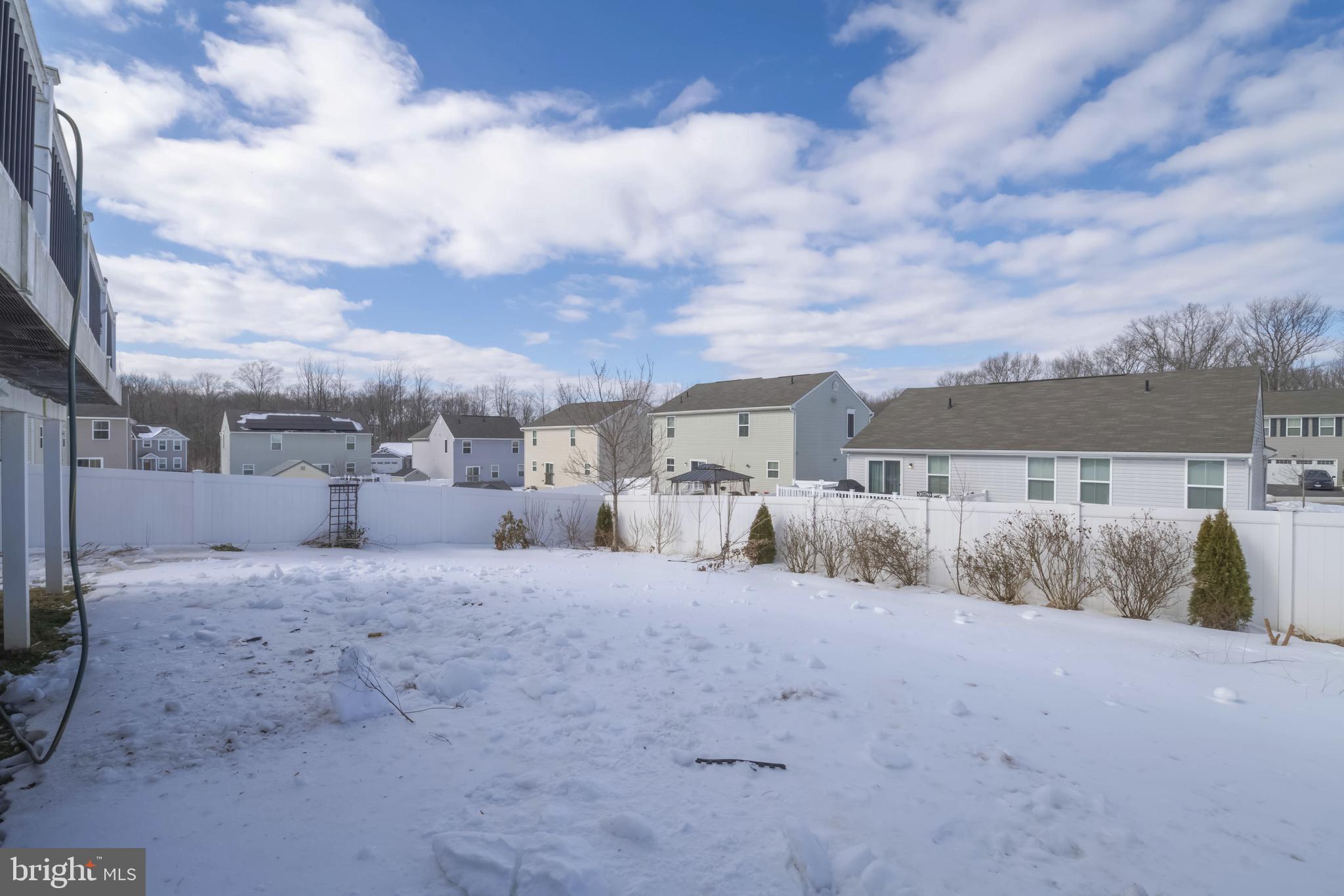 10114 Blansford Way Middle River, MD 21220 - Photo 35 of 41 a view of large house with a big yard and a large window