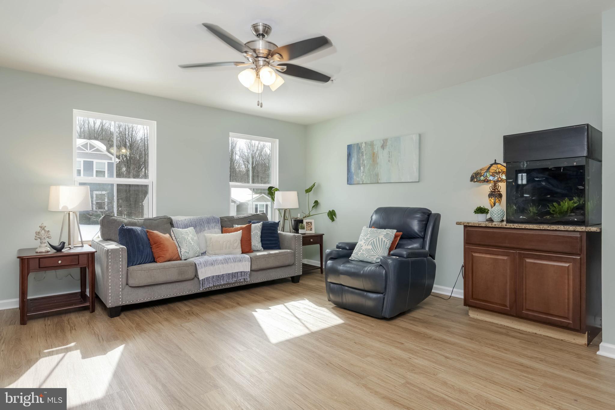 10114 Blansford Way Middle River, MD 21220 - Photo 4 of 41 a living room with furniture and a wooden floor