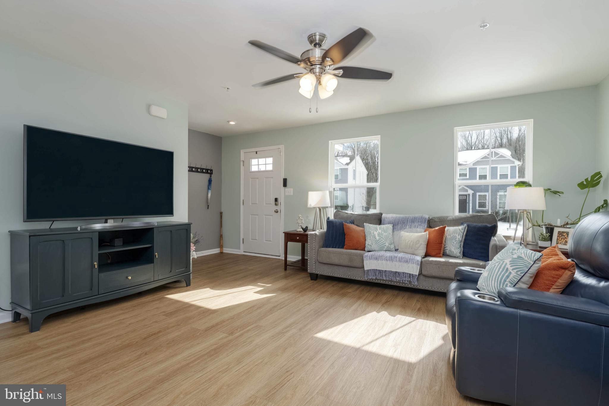 10114 Blansford Way Middle River, MD 21220 - Photo 5 of 41 a living room with furniture and a flat screen tv