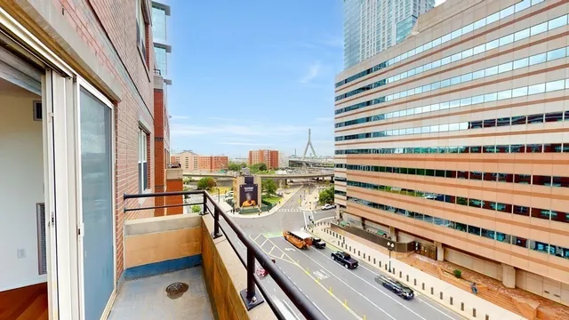 a view of a balcony with chairs