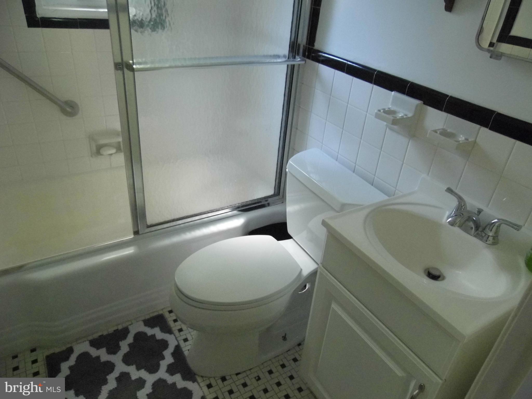 11980 Andrew Street Silver Spring, MD 20902 - Photo 15 of 24 Hall Full Bath