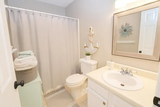 a view of entryway with wooden floor and stairs