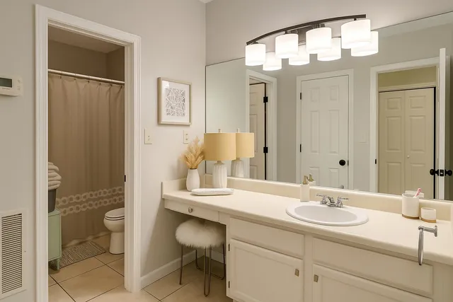 a view of a patio with couches and a fire pit