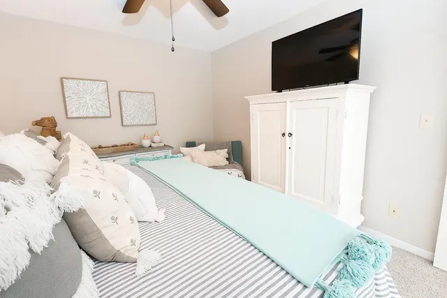 an aerial view of a house with outdoor space