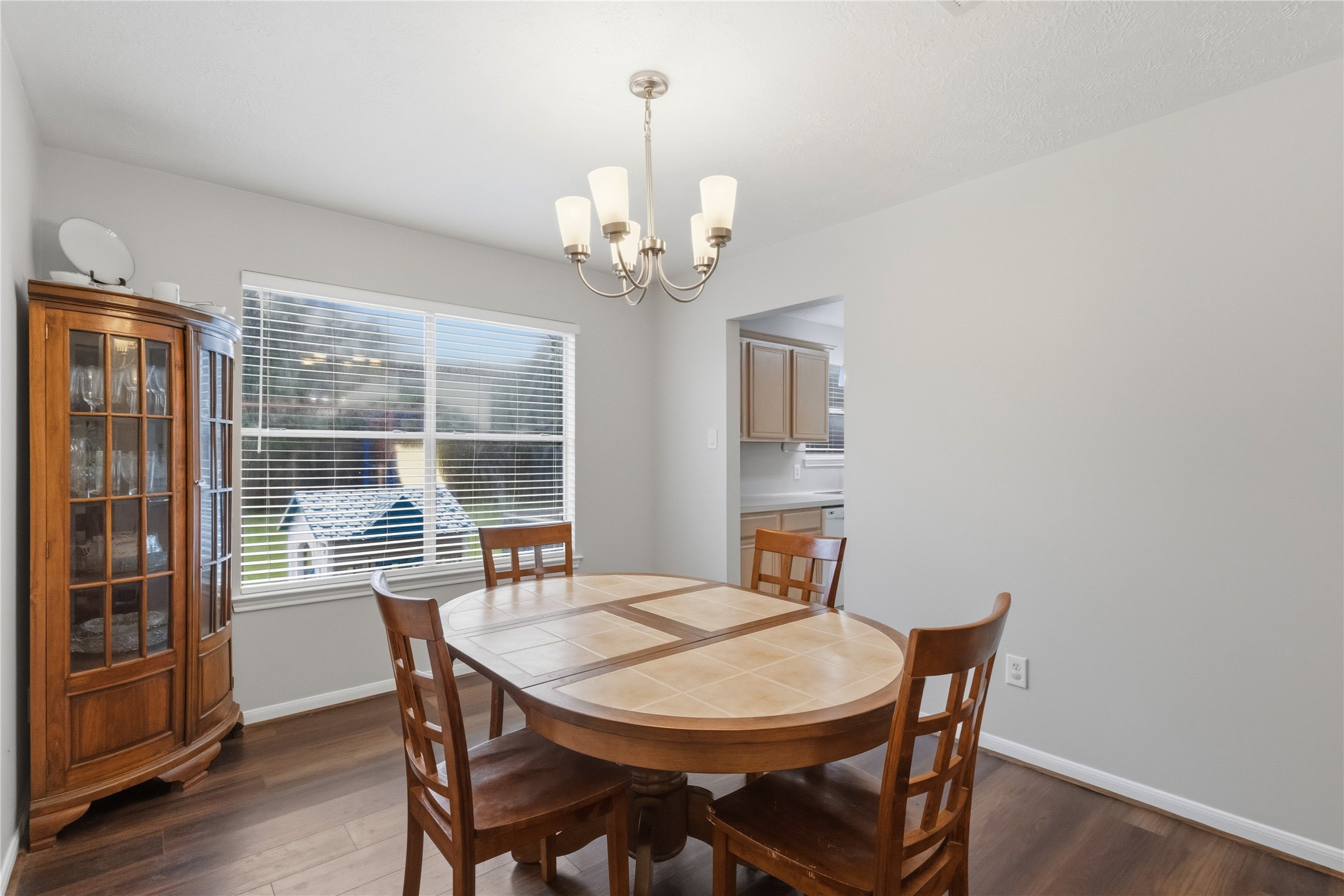 2703 Hidden Spring Vale Drive Spring, TX 77386 - Photo 7 of 29 The Dining room, just off the living room, features a beautiful large window that gives this space lots of natural lighting, creating a warm and inviting atmosphere.