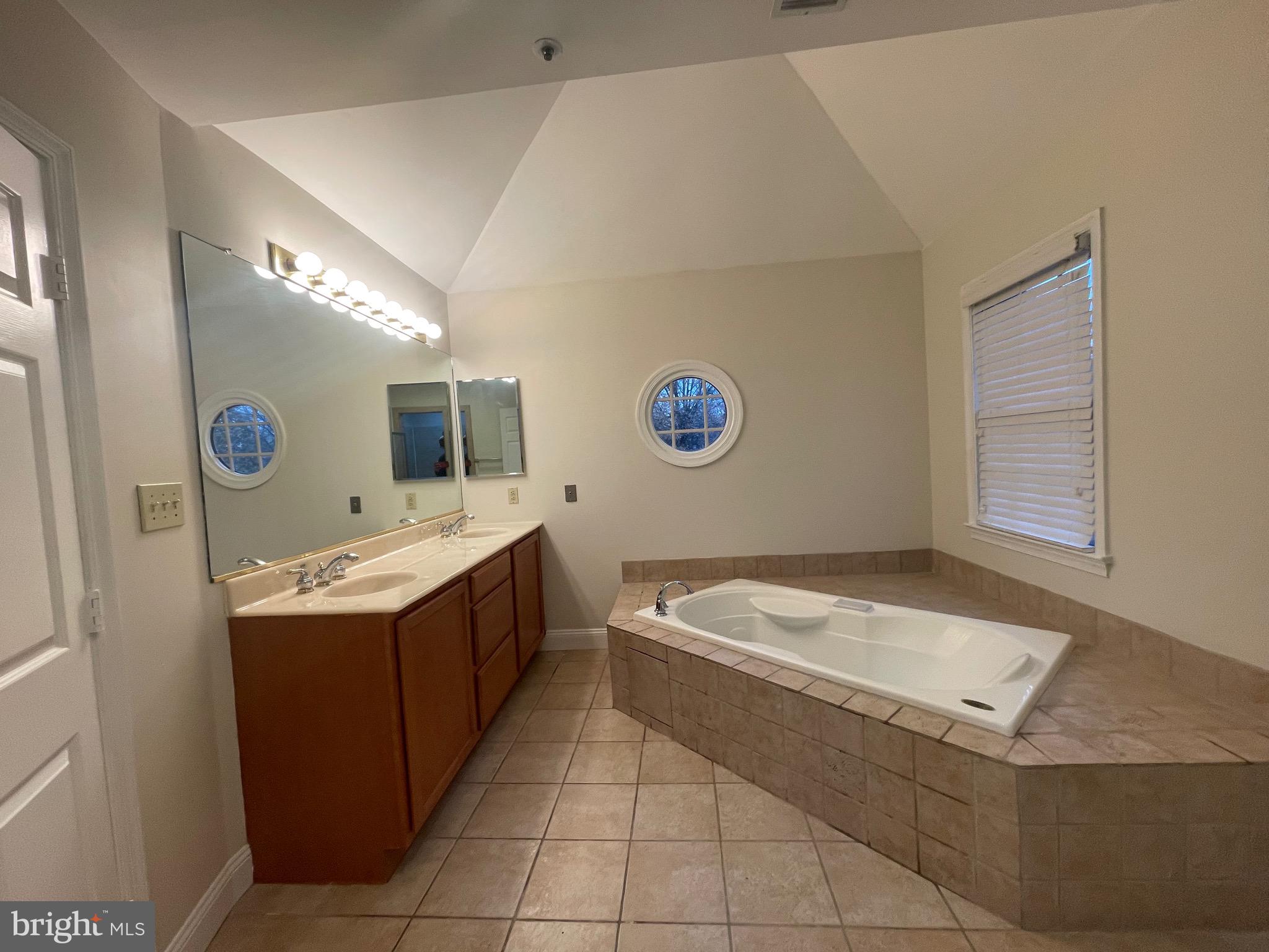 11803 Bishops Content Road Bowie, MD 20721 - Photo 30 of 54 a utility room with a sink a washer and dryer