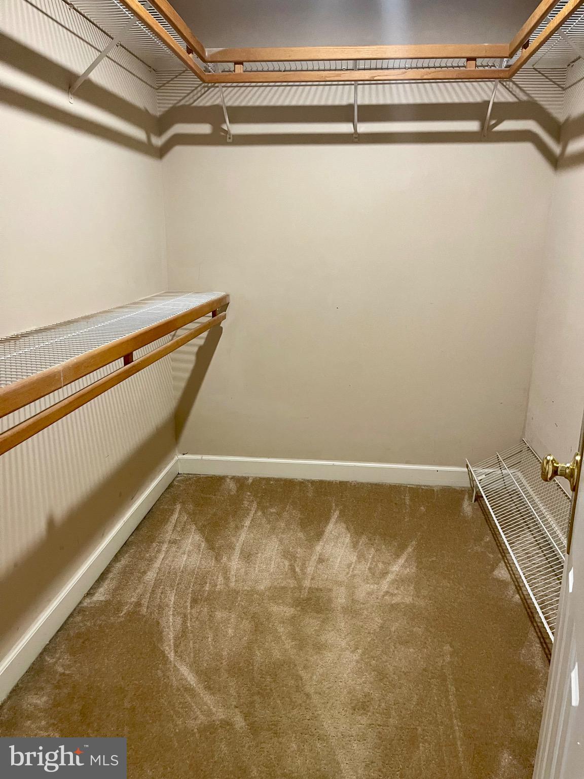 11803 Bishops Content Road Bowie, MD 20721 - Photo 34 of 54 a view of a room with racks on the wall