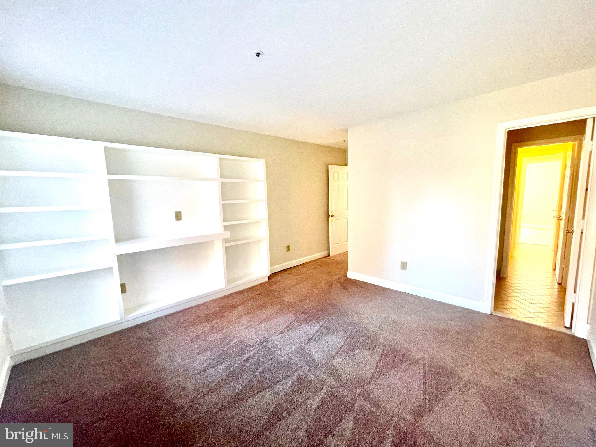 11803 Bishops Content Road Bowie, MD 20721 - Photo 35 of 54 a view of an empty room with a window