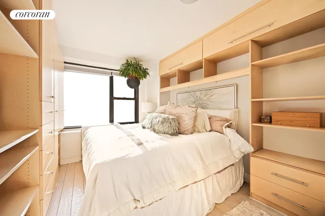 a kitchen with stainless steel appliances a refrigerator sink and microwave