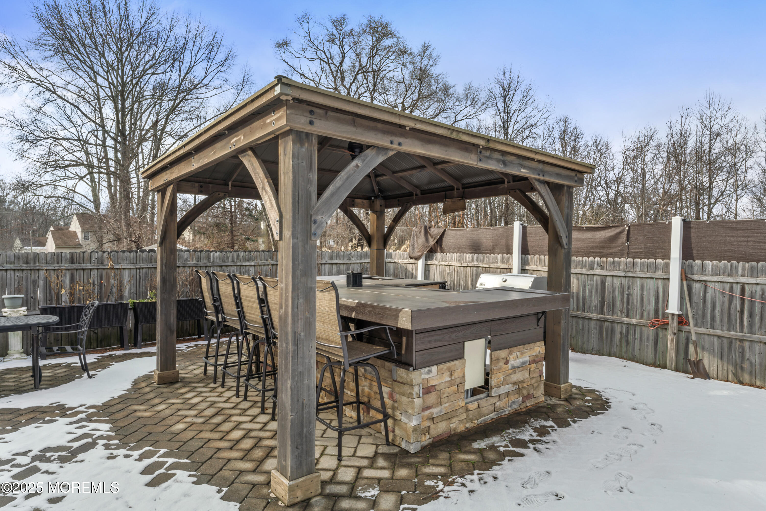 65 Danella Way Howell, NJ 07731 - Photo 35 of 40 Outdoor Stone Bar and Wooden Covering
