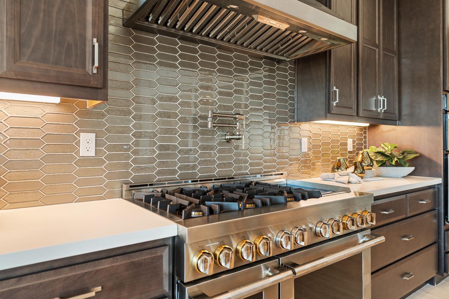 1764 Lester Avenue Clovis, CA 93619 - Photo 15 of 51 a kitchen with a stove and a cabinets