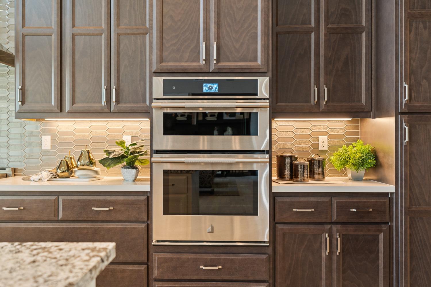 1764 Lester Avenue Clovis, CA 93619 - Photo 17 of 51 a kitchen with granite countertop a stove oven and sink