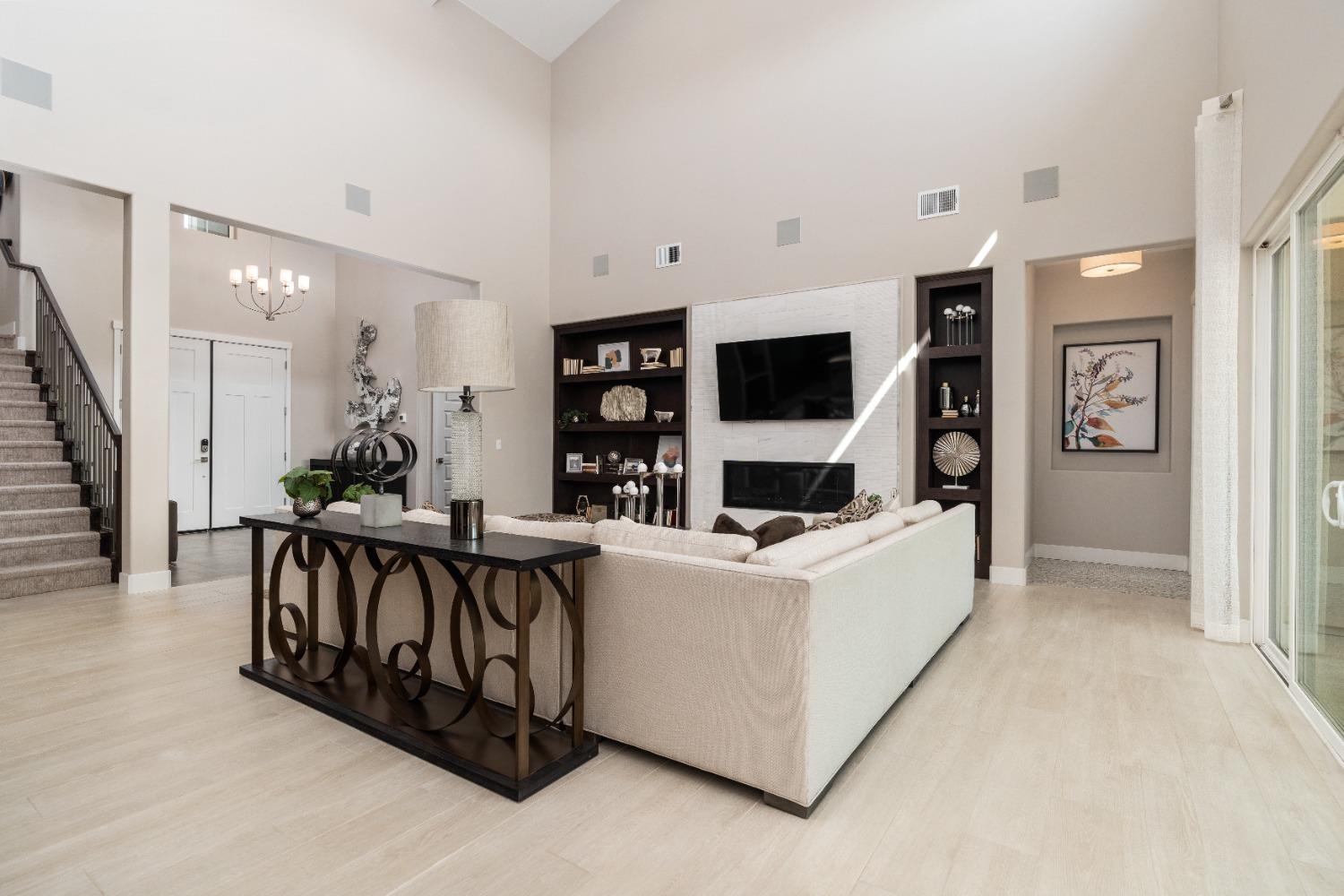 1764 Lester Avenue Clovis, CA 93619 - Photo 25 of 51 a living room with furniture and a flat screen tv