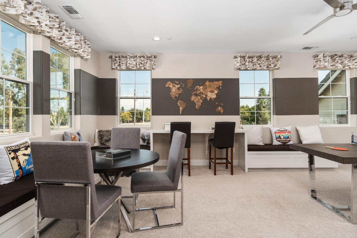 1764 Lester Avenue Clovis, CA 93619 - Photo 29 of 51 a living room with furniture a large window and a flat screen tv