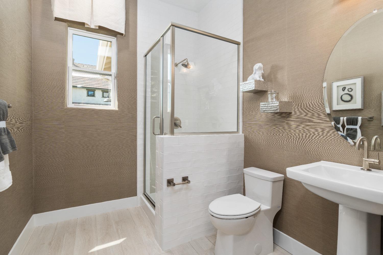 1764 Lester Avenue Clovis, CA 93619 - Photo 36 of 51 a bathroom with a toilet sink and shower