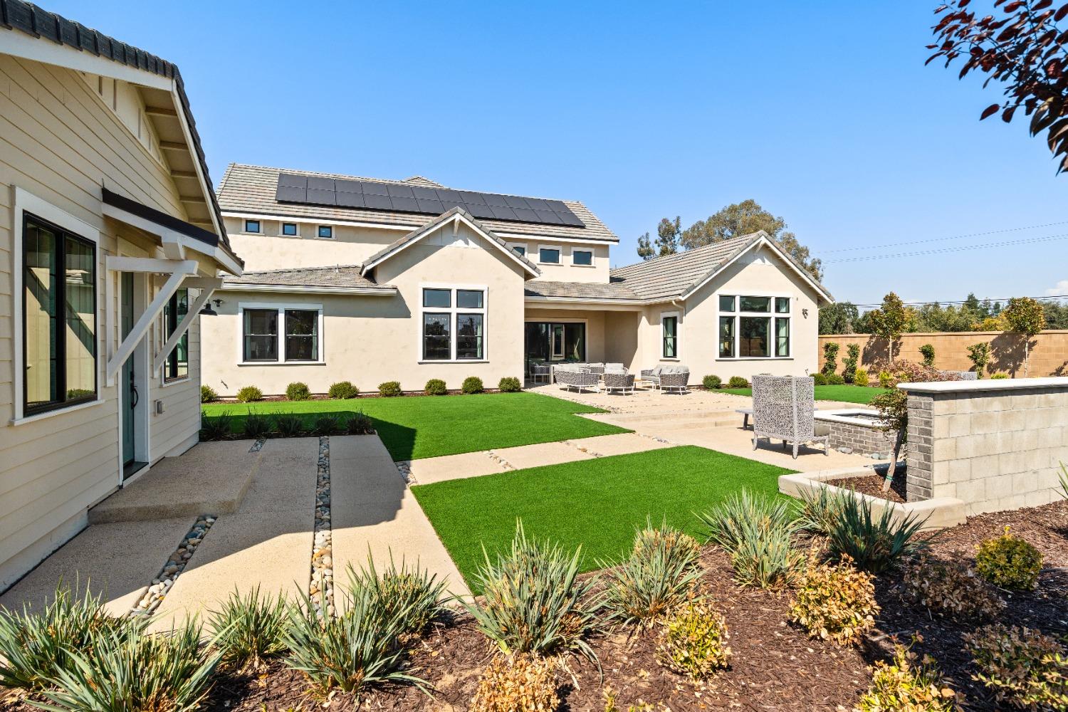 1764 Lester Avenue Clovis, CA 93619 - Photo 45 of 51 a front view of a house with garden