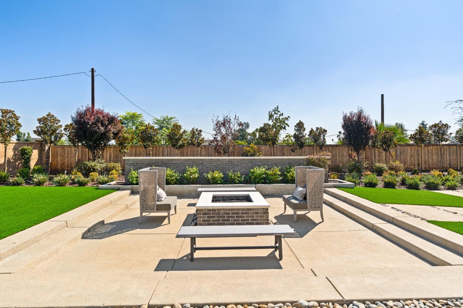 1764 Lester Avenue Clovis, CA 93619 - Photo 47 of 51 a view of a chairs and table in the garden