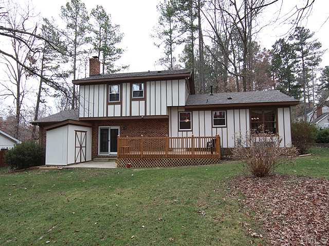 1509 Falls Church Road Raleigh, NC 27609 - Photo 15 of 18 a front view of a house with garden