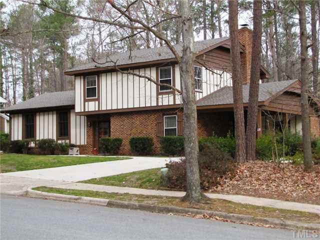 1509 Falls Church Road Raleigh, NC 27609 - Photo 2 of 18 a front view of a house with a yard